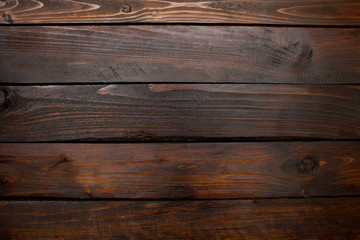 Fototapeta na wymiar Dark boards wooden abstract background. Top view
