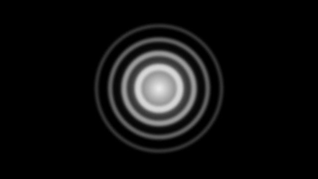 A graphic showing a white shock wave pulse emanating from a central point on a black background