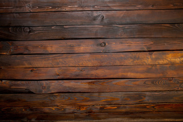 Obraz na płótnie Canvas Dark boards wooden abstract background. Top view