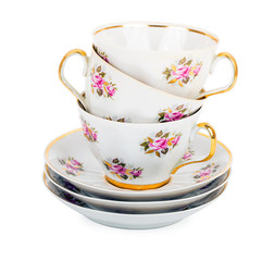 stack of teacups with saucers - 176831743