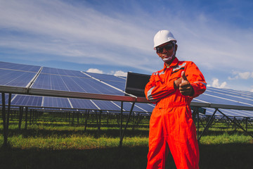 operation and maintenance in solar power plant ; engineer working on checking and maintenance in solar power plant ,solar power plant to innovation of green energy for life