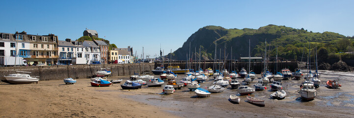 Ilfracombe Devon UK with boats in the harbour on beautiful spring day panoramic view 
