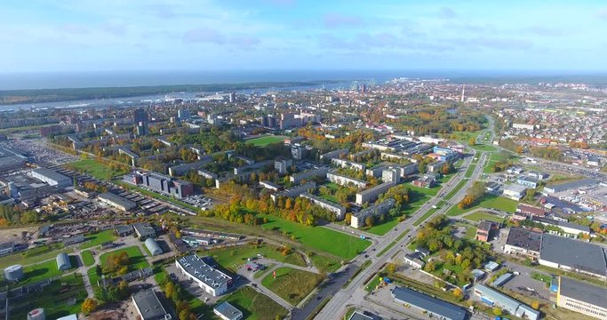 KLAIPEDA, LITHUANIA - OCTOBER 15, 2017: AERIAL. Smooth drone flight through Klaipeda City at high altitude