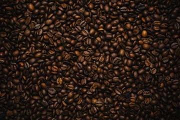 Top viev of coffee beans background texture