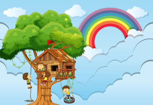 Children playing on treehouse