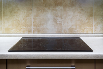 Modern kitchen stove, black flat induction cooker, electric ceramic hob
