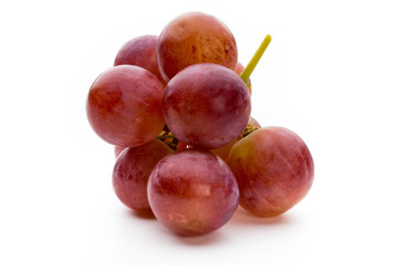 Ripe red grape isolated on white.