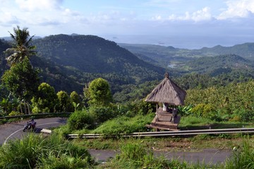 Fototapeta na wymiar A hut and its magnificent view in Karangasem (taken from Bukit Putung), Bali, Indonesia
