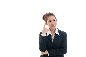 Smiling young Asian businesswoman in black suit and white t-shirt pointing finger isolated on white background