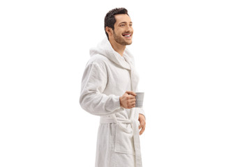 Guy in a bathrobe holding a cup