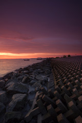 Obraz premium scenery of sunset at Tanjung Piandang,Perak,Malaysia. Soft focus,motion blur due to long exposure. visible noise due to high iso