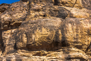The pre-islamic rock inscriprions (low-left corner and middle-left of the rock crack) in Wadi Massal
