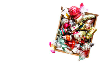 bright christmas balls and toys on white background