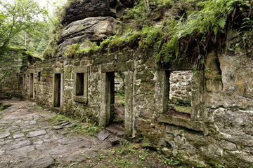 Walls of broken abandoned mill
