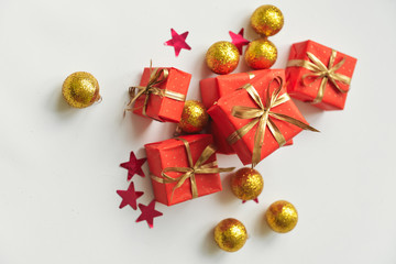 christmas composition, spruce branches to gifts in red boxes, christmas decor