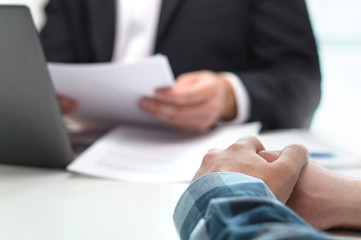 People having meeting in office. Boss with a job applicant in interview. Lawyer with client....