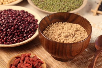 Black rice ,rice, millet, beans, goji (wolfberry)， and grind up those to make some kind of healthy food flour. It is a popular food in China, and named wugufen. 