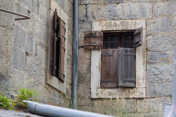 Fototapeta na wymiar Wooden shutter, old wall