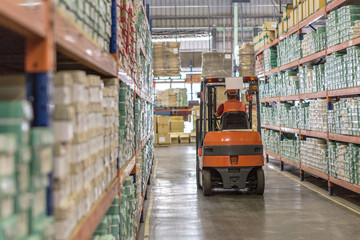 Forklift truck in warehouse