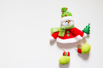 Christmas smiling snowman felt with cap and scarf.Christmas decorations with Snowman toy and figures. Christmas and New Year concept
