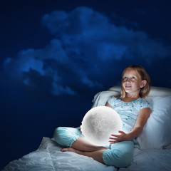 Girl in her bed and moon planet