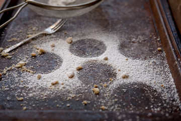 Top view baking tray with icing sugar