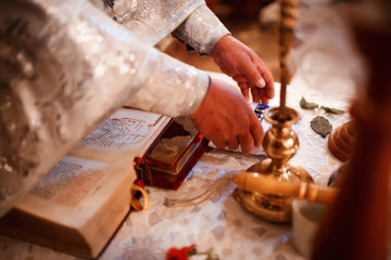 hands of a priest at the temple