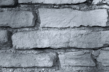 Steinmauer in schwarz weiß