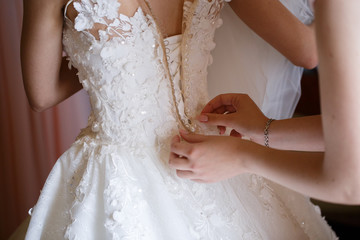 beautiful bride dress decorated with beads and lace - Powered by Adobe