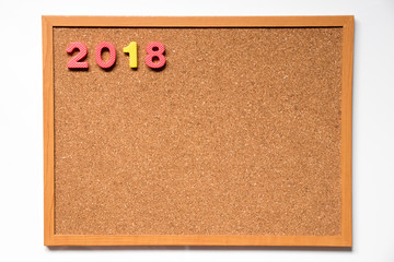 Cork board with number as 2018 wording on white background