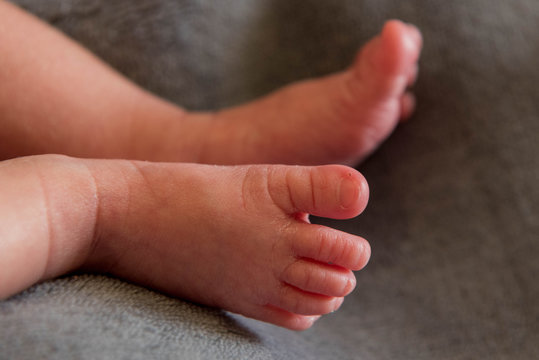 Newborn baby girl's legs