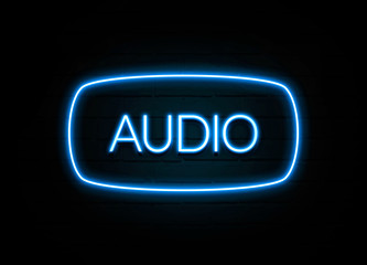 Audio  - colorful Neon Sign on brickwall