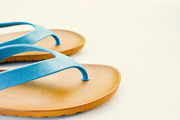 blue sandal on table