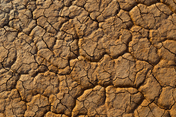 Cracked red ground texture ground for background