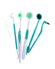 Set of dental cleaning tools including a toothbrush dental floss disposable and plastic flossing...