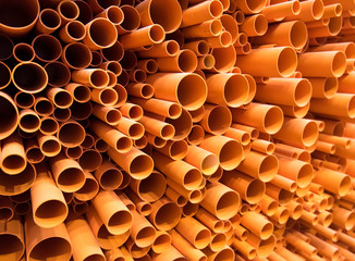 PVC pipes stacked in construction site