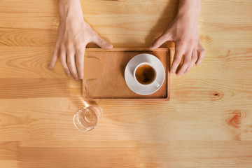 Coffee house counter background with coffe cup, top view