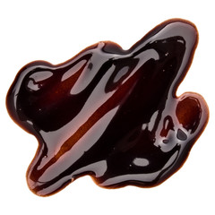 Chocolate syrup drop isolated on white background. Top view. .