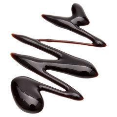 Obraz premium Chocolate syrup drop isolated on white background