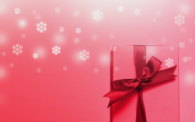 pink gift box with snow Christmas concept
