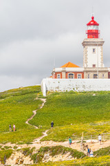 Fototapeta na wymiar People visiting Cabo da Roca Lighthouse