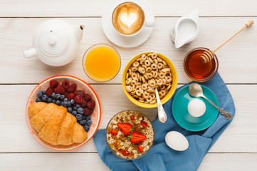 Continental breakfast menu on woden table
