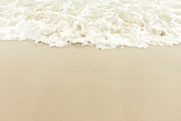 Fototapeta na wymiar Soft wave of tropical beach