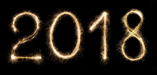 2018 written with a sparklers isolated on black background