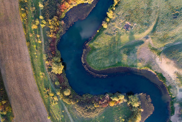 Top view of river and nature in autumn