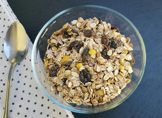 Muesli with dried fruit in bowl