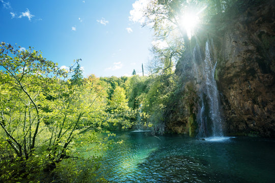 waterfall in forest, Plitvice Lakes, Croatia © Iakov Kalinin