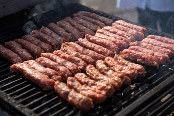 Raw meat, mici, mititei, cevapcici, pork meat rolls
