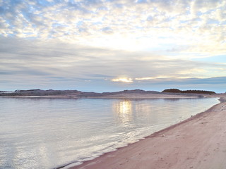 autumn sunset on the sea coast in the city