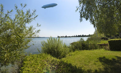 The waterside near Niederzell on the island Reichenau with zeppelin - Island of Reichenau, Lake...